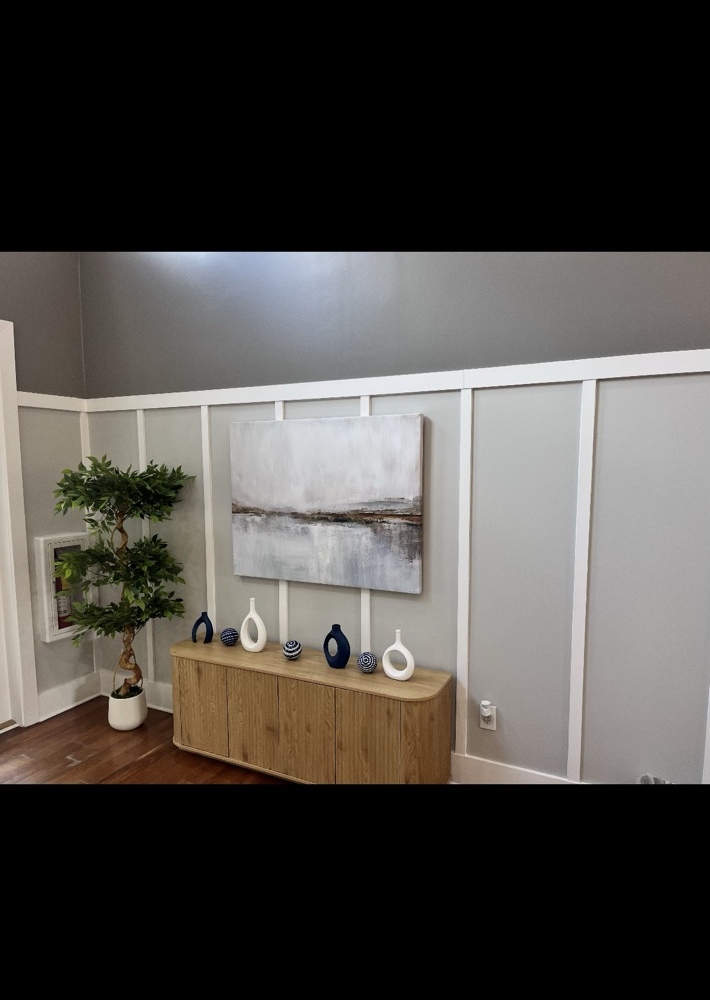 Staged console and wall décor