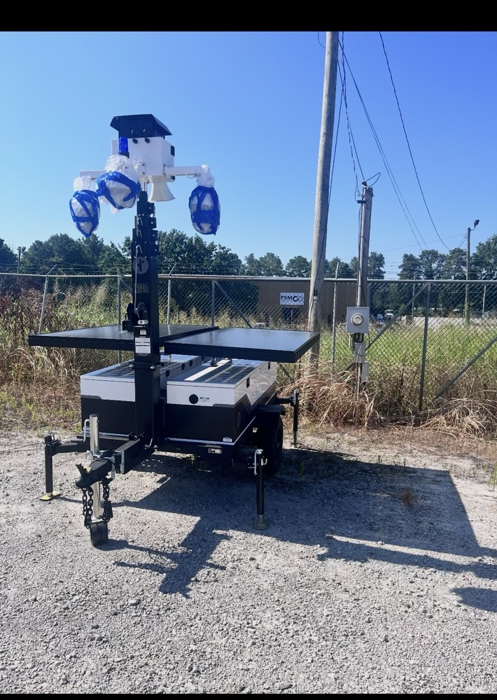 Solar-powered mobile security camera system installed on site